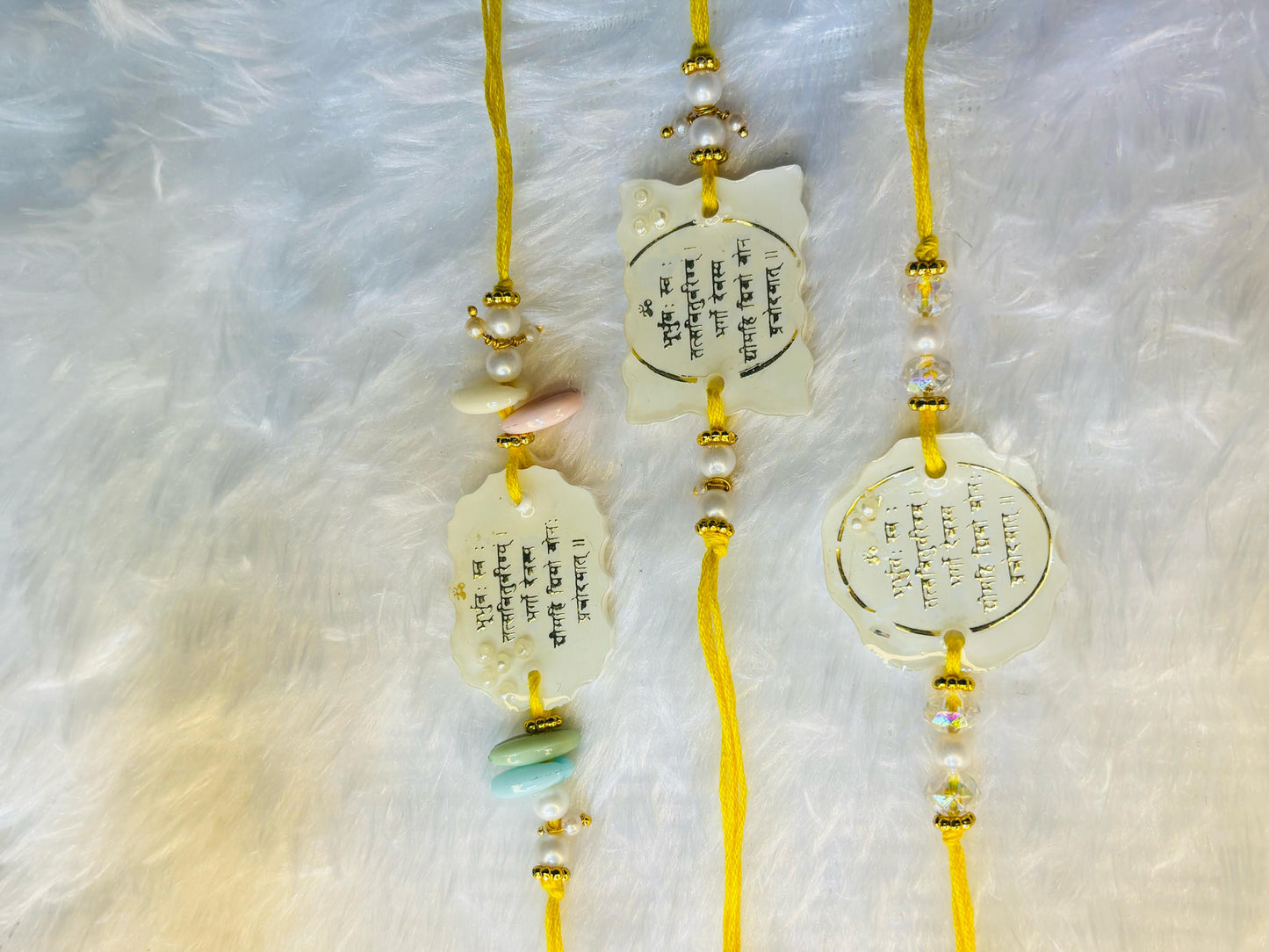 Spiritual Resin Rakhi Set – Sacred Symbols & Premium Design. Set of FIVE