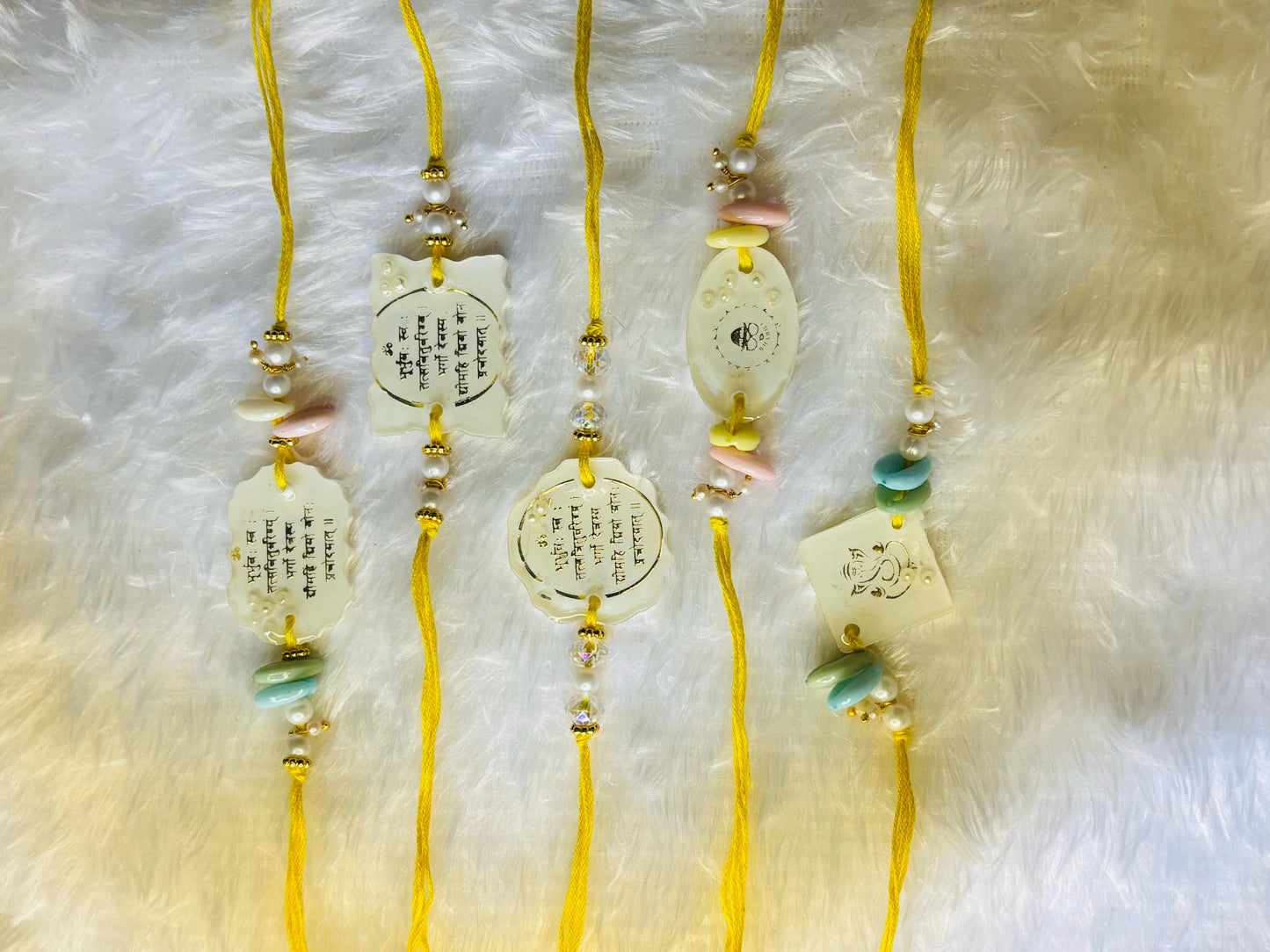 Spiritual Resin Rakhi Set – Sacred Symbols & Premium Design. Set of FIVE