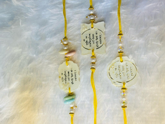 Spiritual Resin Rakhi Set – Sacred Symbols & Premium Design. Set of FIVE