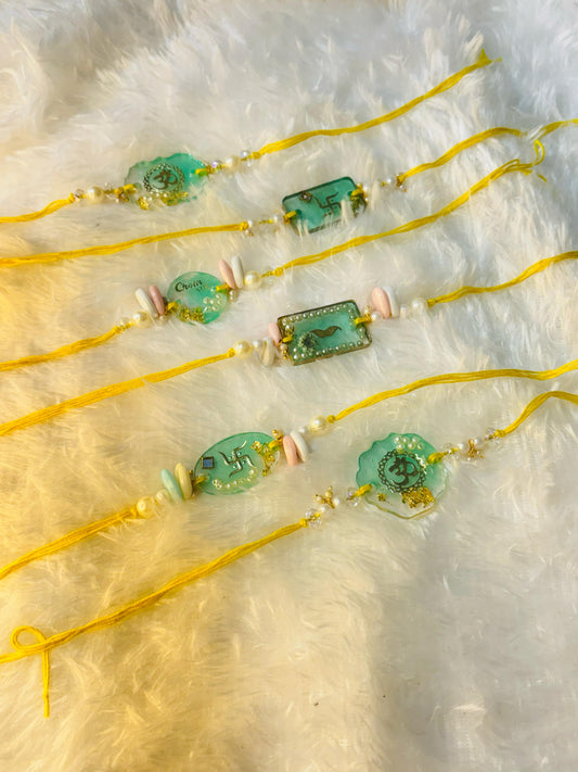 Spiritual Resin Rakhi Set – Sacred Symbols & Premium Design. Set of FIVE